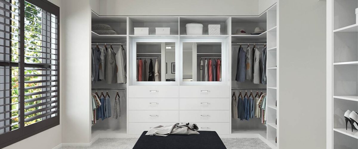 light and airy white walk-in wardrobe