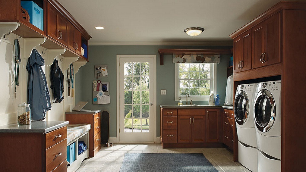 large laundry room with custom cabinets