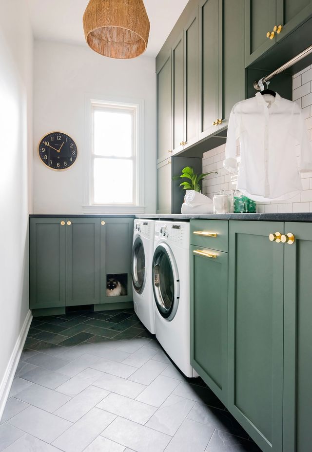 laundry room with corner cabinets